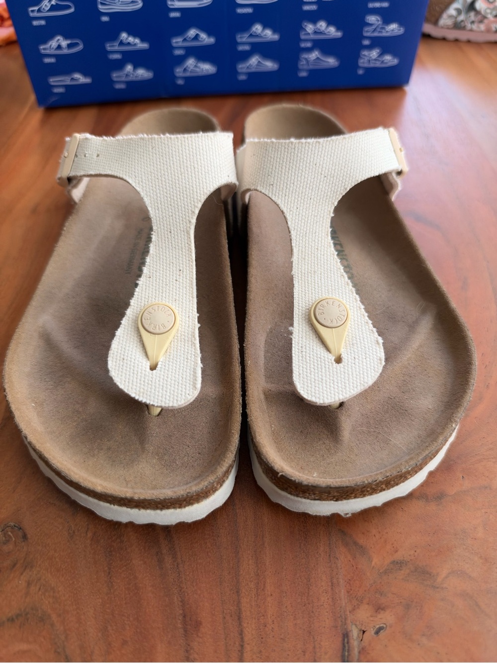 Birkenstock White Canvas Toe-Post Sandals with Gold Accents